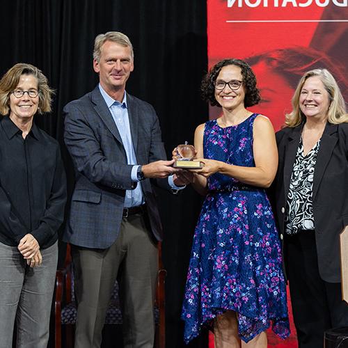 Image of Patty Tarantello receiving the Board of Trustees Faculty Award for Distinguished Teaching.